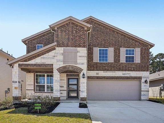 The Somerville plan in Pine Lake Cove of Conroe, TX.