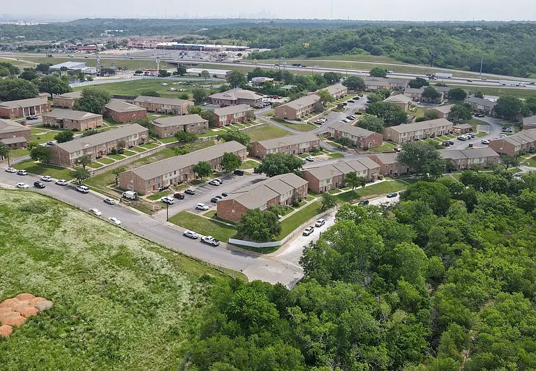 Stunning aerial view showcasing the lush landscaping and spacious layout of Vista Montana Apartments in Dallas, TX.