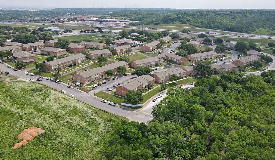 Stunning aerial view showcasing the lush landscaping and spacious layout of Vista Montana Apartments in Dallas, TX.