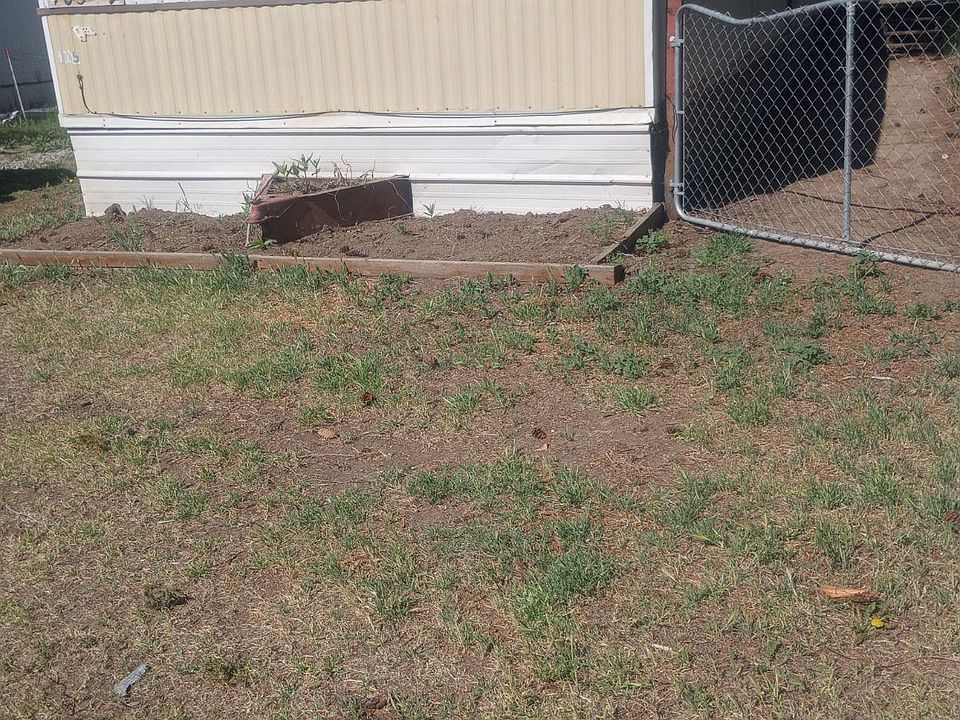 Unit #9, comes with flower bed and off-street parking