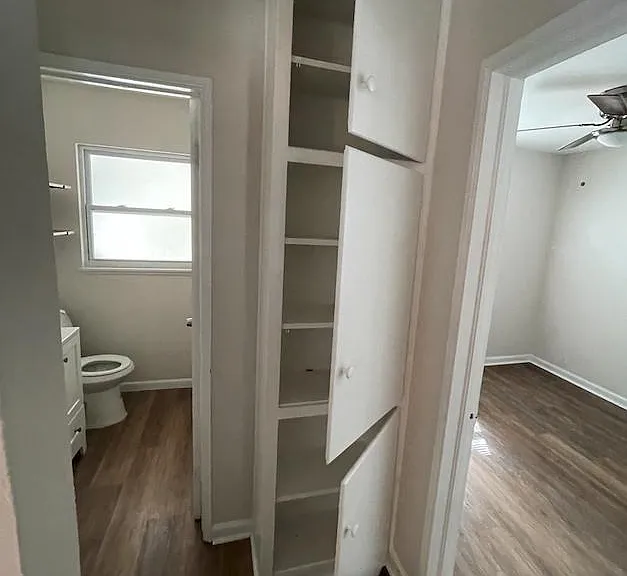 built in shelving next to Bedroom 2