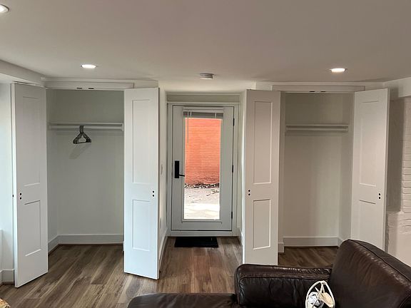 Entryway with huge coat/storage closets