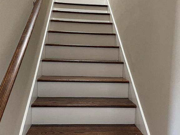 Leads to two bedrooms upstairs