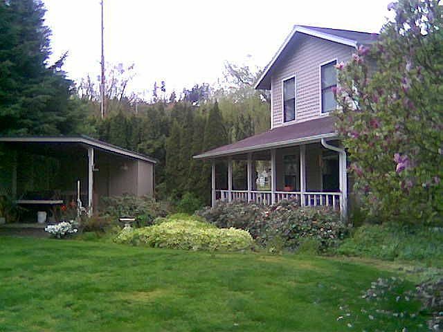 Front of house,sauna, hot tub,pond