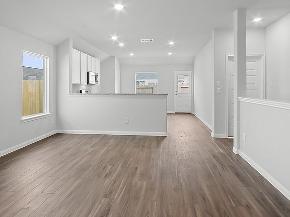 Family Room to Kitchen and Dining Area