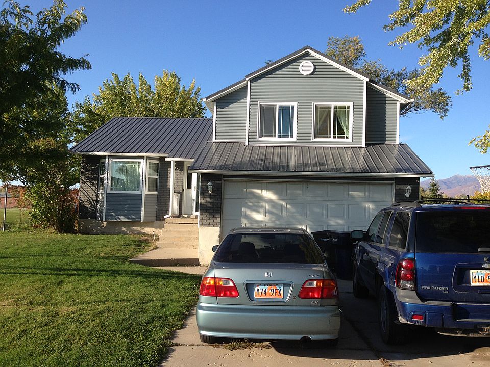 New siding and metal roof