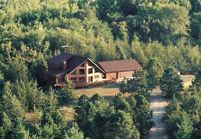Situated 70' above the river on the last sand dune bluff on the MN River