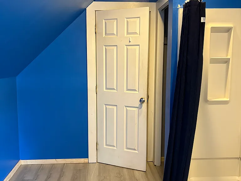 Cross view of large bathroom
