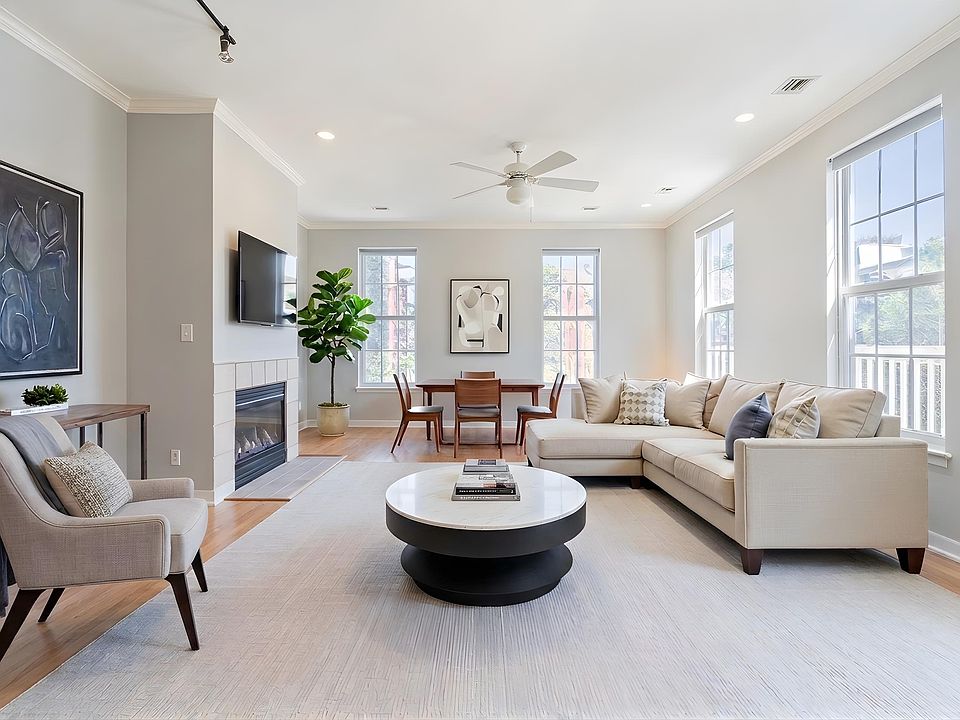 A living area with fireplace at The Residences at King Farm