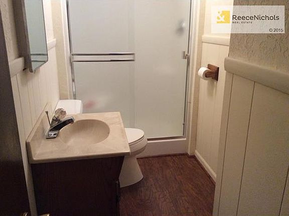Bathroom has shower only & laminate floor.