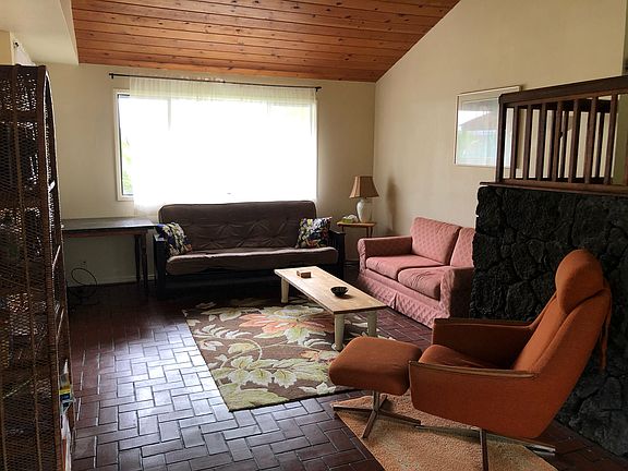 Living room from the front door, Kitchen and Dining on left