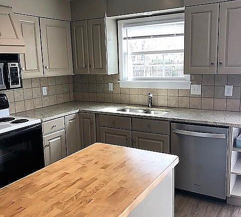 Open Kitchen, Dining, and Living space. New updated appliances