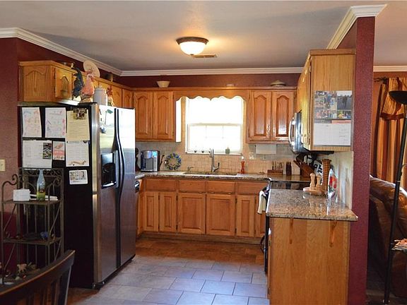 Updated kitchen with granite countertops.