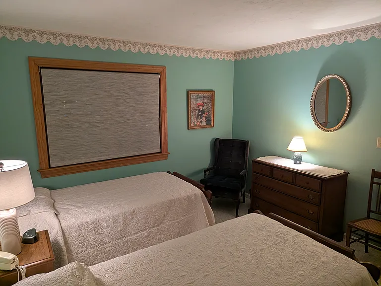 guest bedroom, double window, bureau, nightstand, chairs