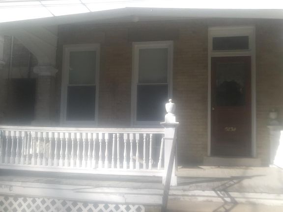 Front porch and private 2nd floor apartment entry door