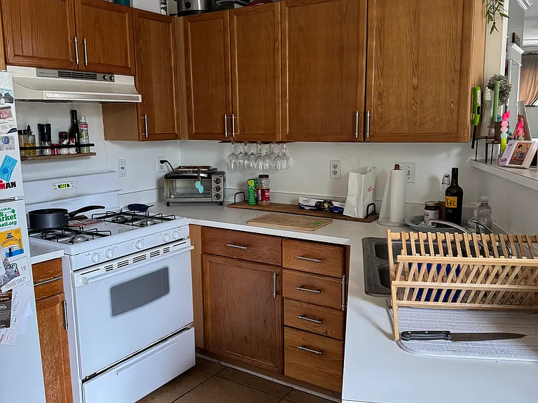 Kitchen with lots of cabinets.