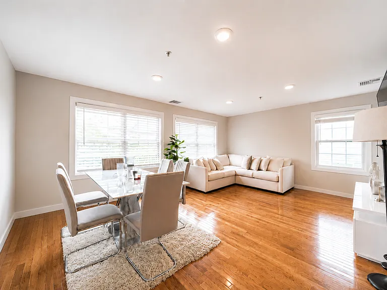 Bright, spacious living and dining area filled with natural light