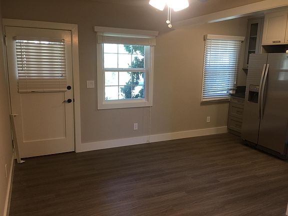 View of the living room,  front door on Left as seen from th