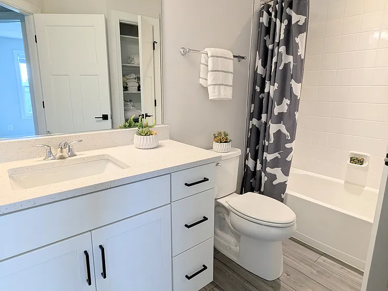 2nd full bath w QUARTZ counter, bathtub, tile shower walls, linen closet, shaker style doors