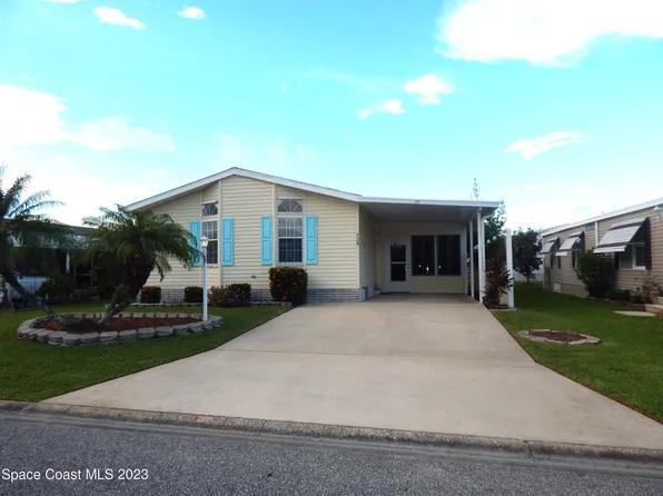 734 Hyacinth Cir, Barefoot Bay, FL 32976
