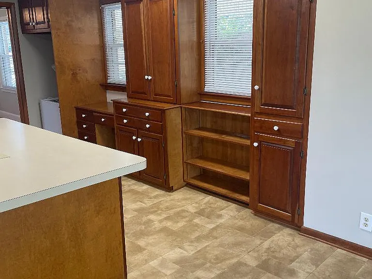 chest freezer at end of cabinets