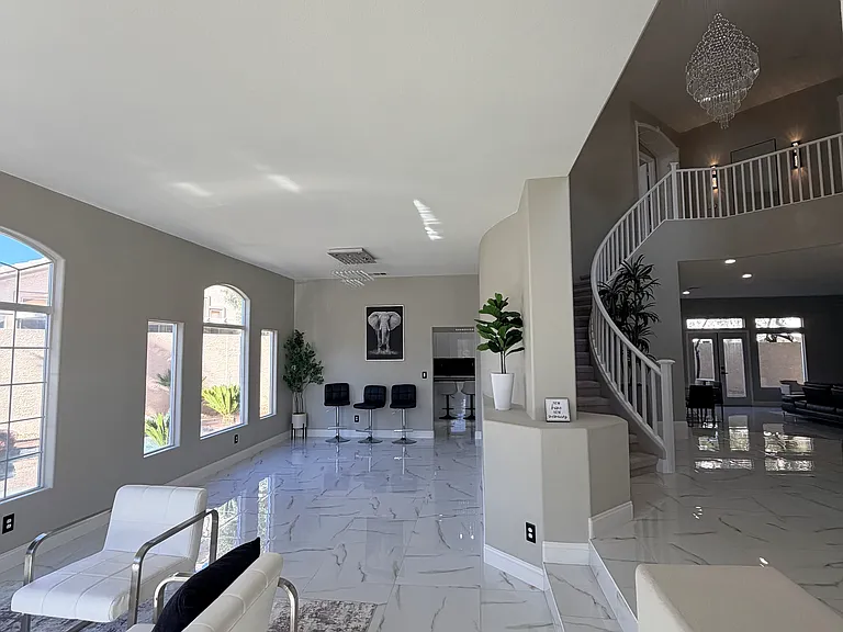 Alternate view of the foyer and seating area.