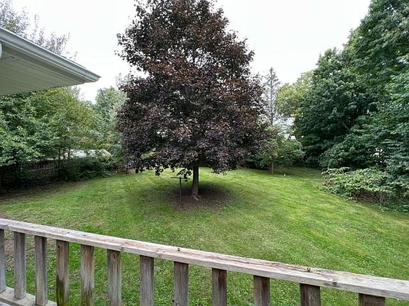 Spacious fully fenced in backyard with balcony.