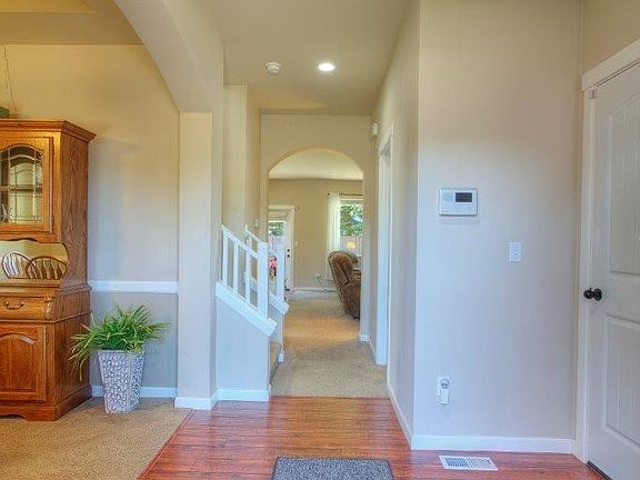 Durable laminate floors in the front entry.