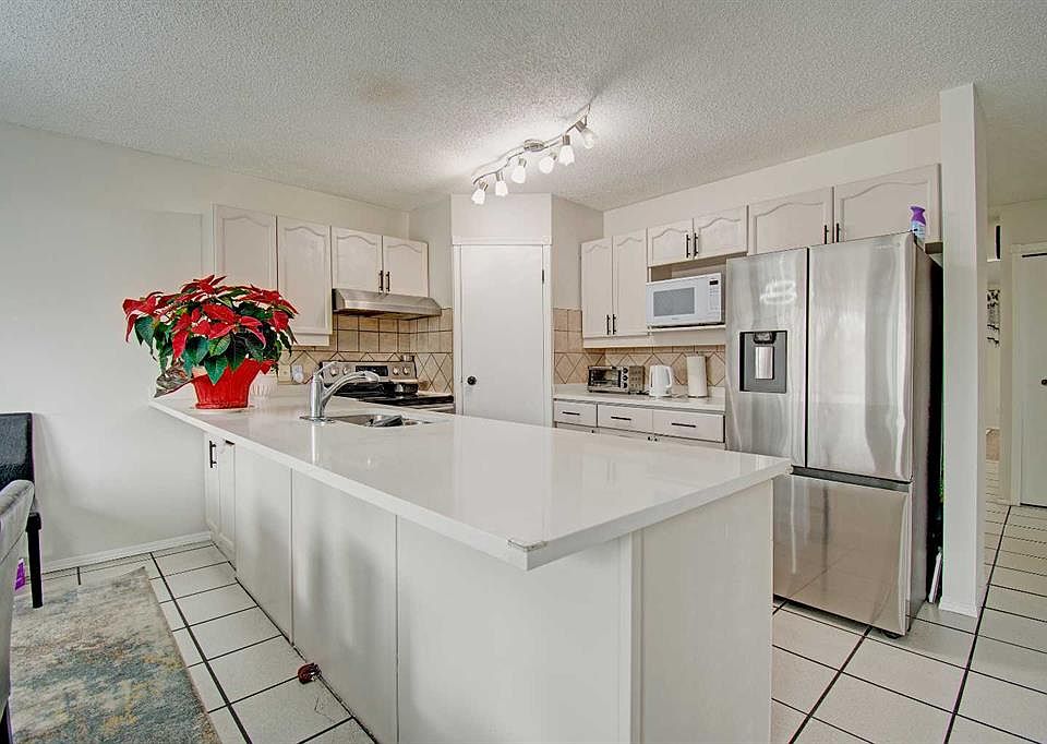 1st image of 10316 Hidden Valley Dr NW