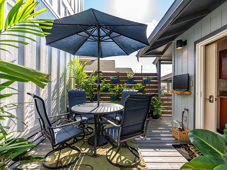 Garden patio setting with plant wall off the kitchen