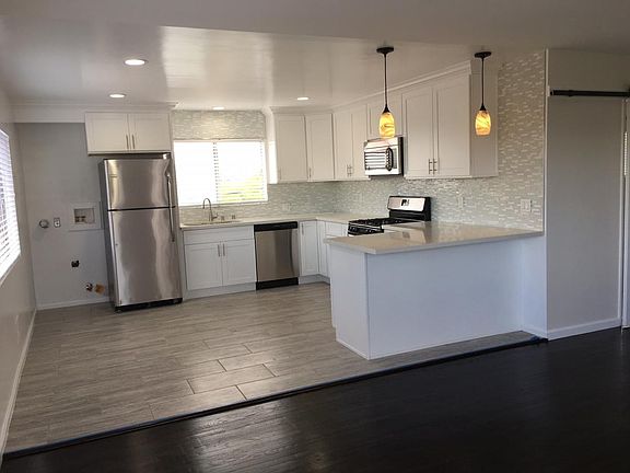 View of kitchen w/washer/dryer hookups