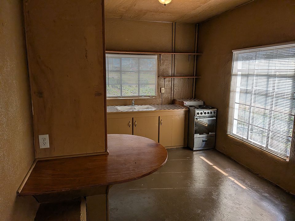 Kitchen View from Living Room. Built in breakfast bar