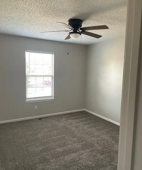 View of front bedroom from hallway
