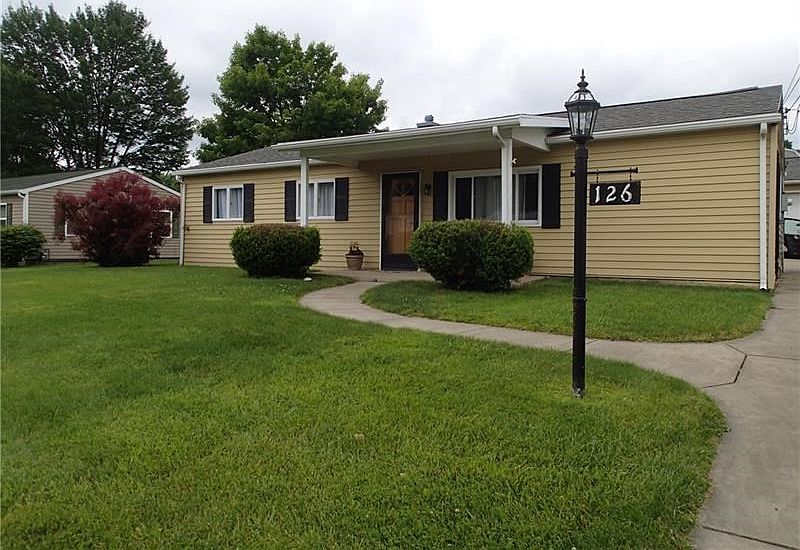 Welcome home to one level ranch at 126 Birch Street in Brighton Township!