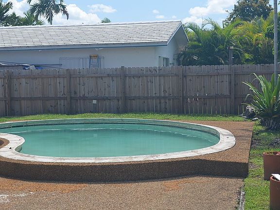 Pool with fenced in yard