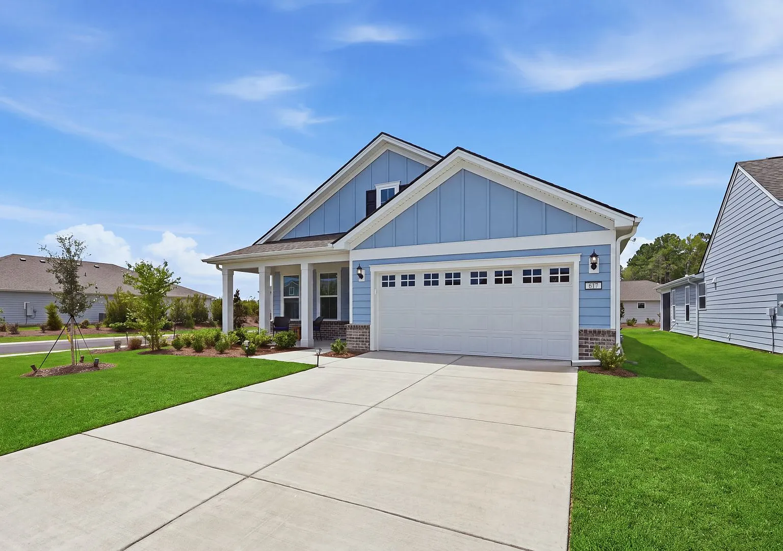 Modern Elegance Meets Resort-Style Living at 617 Eagle Landing Lane — Photo 3