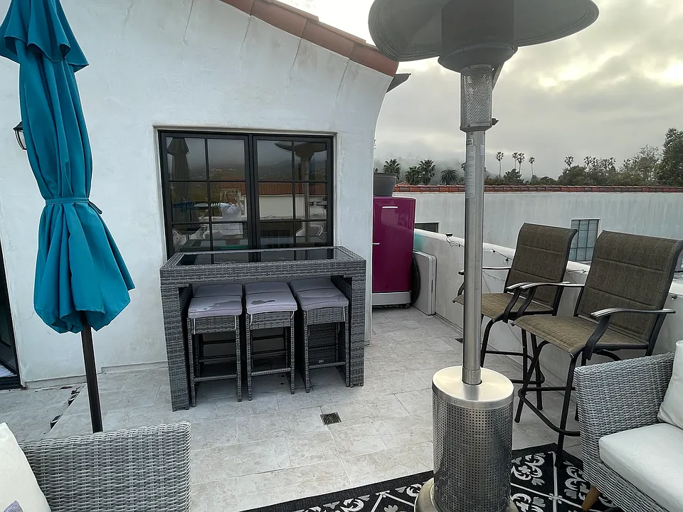 Outdoor patio gas heater and umbrellas, and more seating