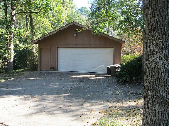 DOUBLE CAR DETACHED GARAGE W/22X24 SHOP.