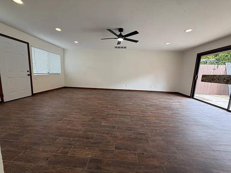 1 of three living spaces. This one has a private courtyard out the front and a sliding glass door out the back!