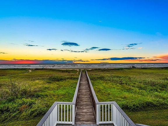 Unobstructed views of the ocean, access the beach from the private dune walkover.