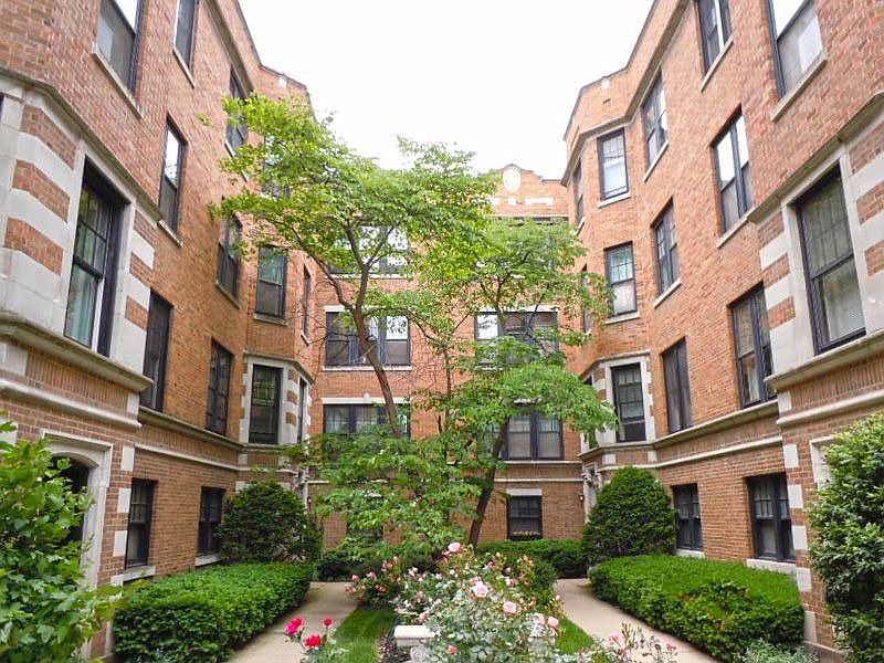 Front of Lovely Condo with Wonderfully Landscaped Courtyard