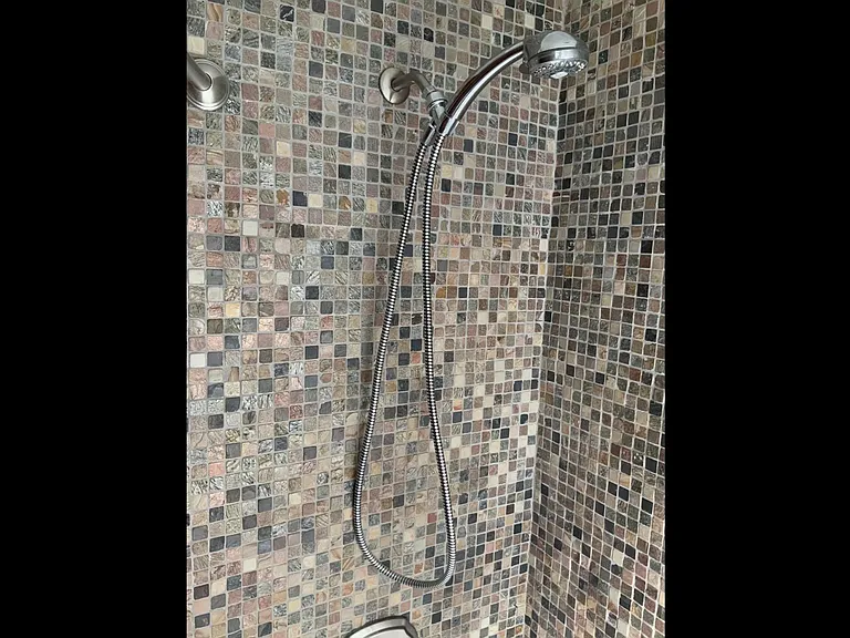 Mosaic tile jacuzzi tub/showe