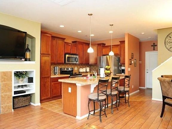 Open Kitchen with Stainless Steel Appliances