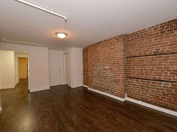 3rd image of 57 E 3rd St APT A