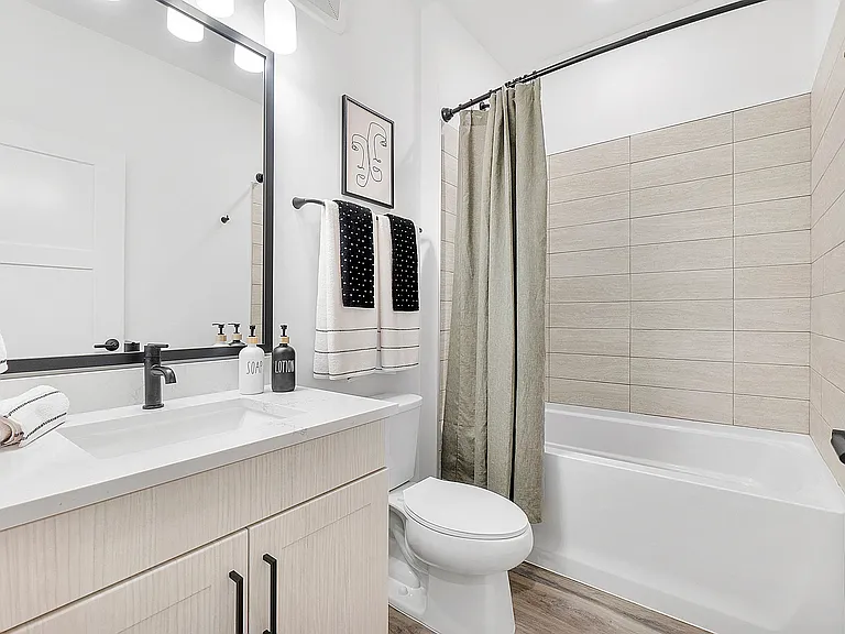 Guest bathroom with bathtub