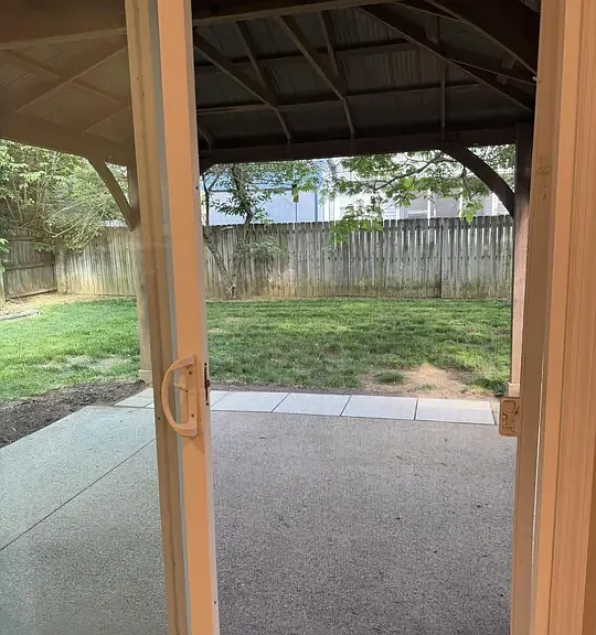 View of Patio and Yard thru Family Room door