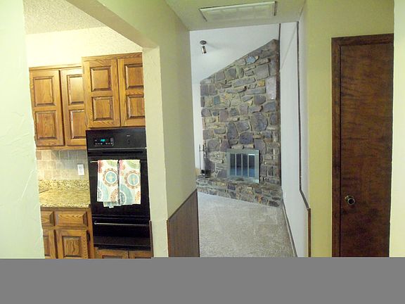 View from foyer to kitchen and living