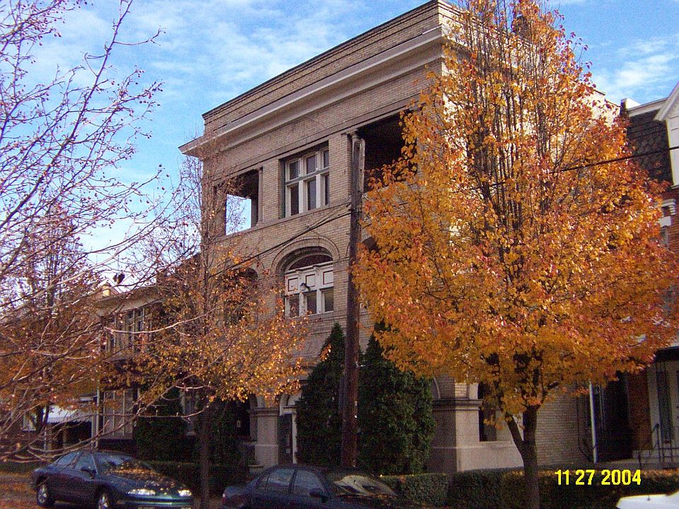 Front of Building Apartment is the top left. Big porch in front