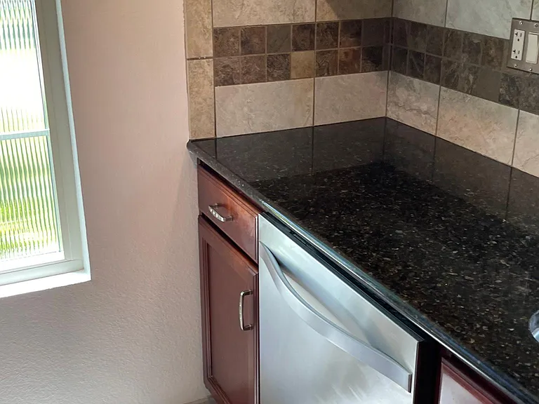 Stainless steel dishwasher, granite counter tops