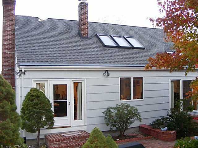 Exterior Front. Warm and in...